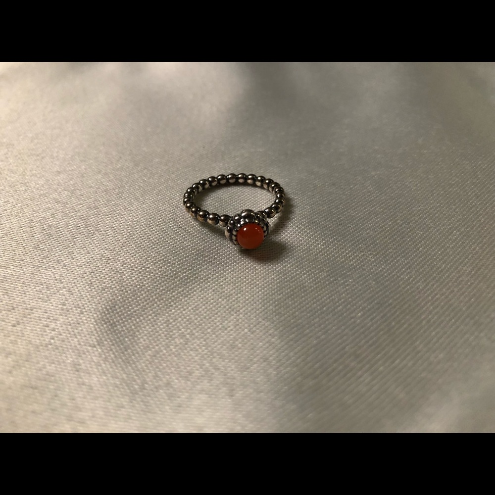 Pandora ring with orange stone